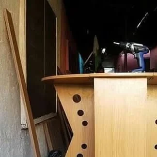 Foldable wood dining table during fabrication