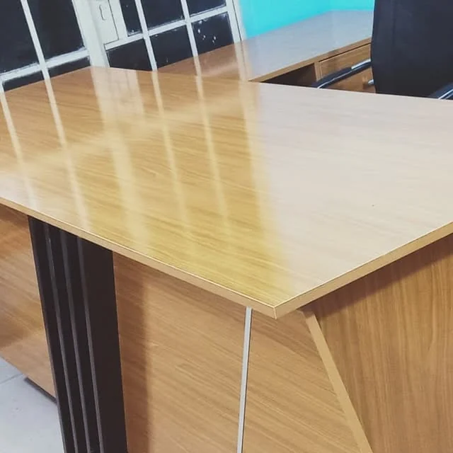 Wood-finish reception table designed for Top Class Schools